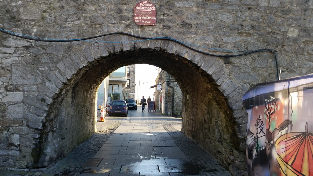 A surviving section of the city walls with a brief description above the entrance. Connemara Galway day trip